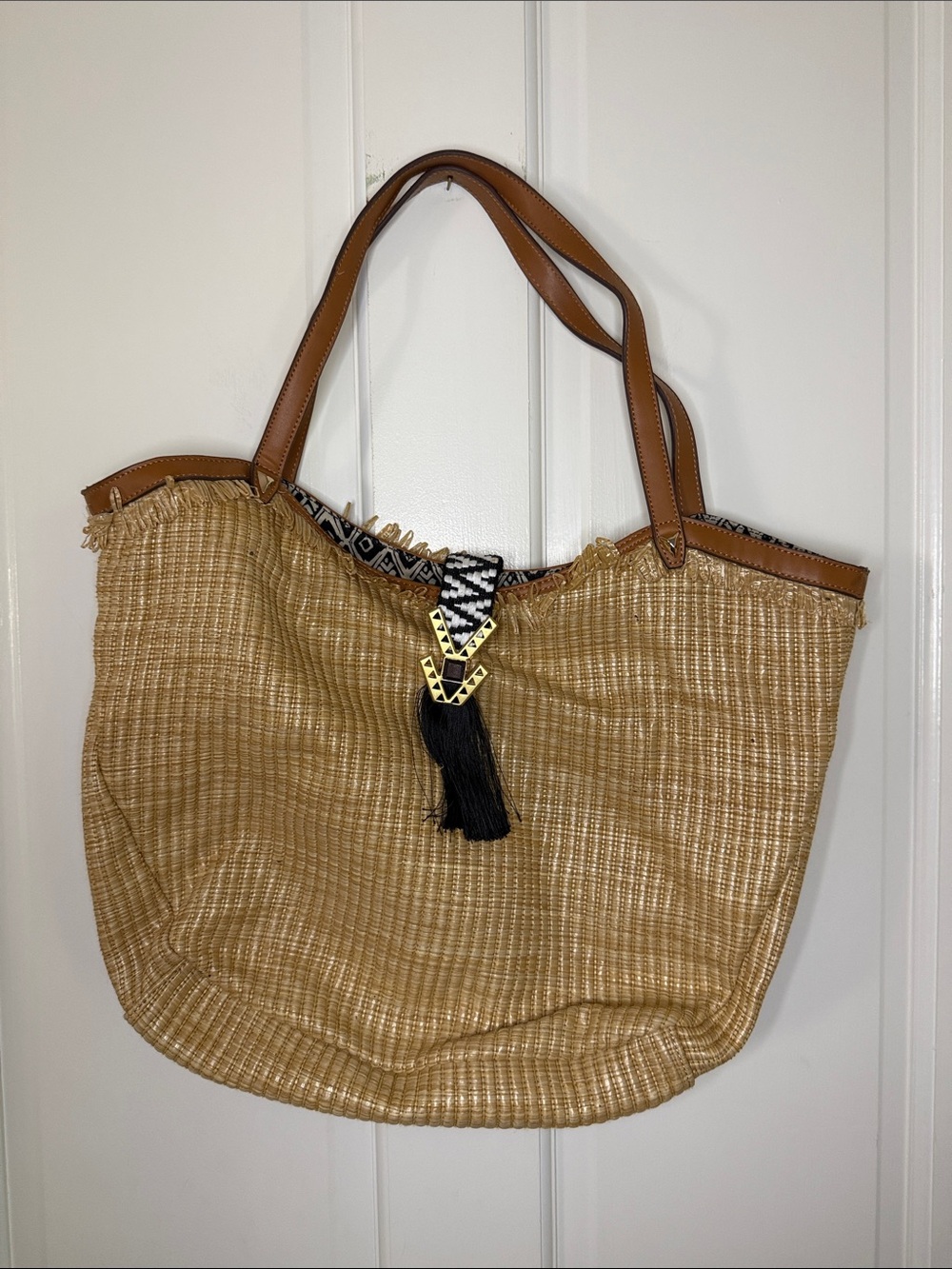 Stella & Dot Natural Straw Tote with Black Tassel and Tan Handles